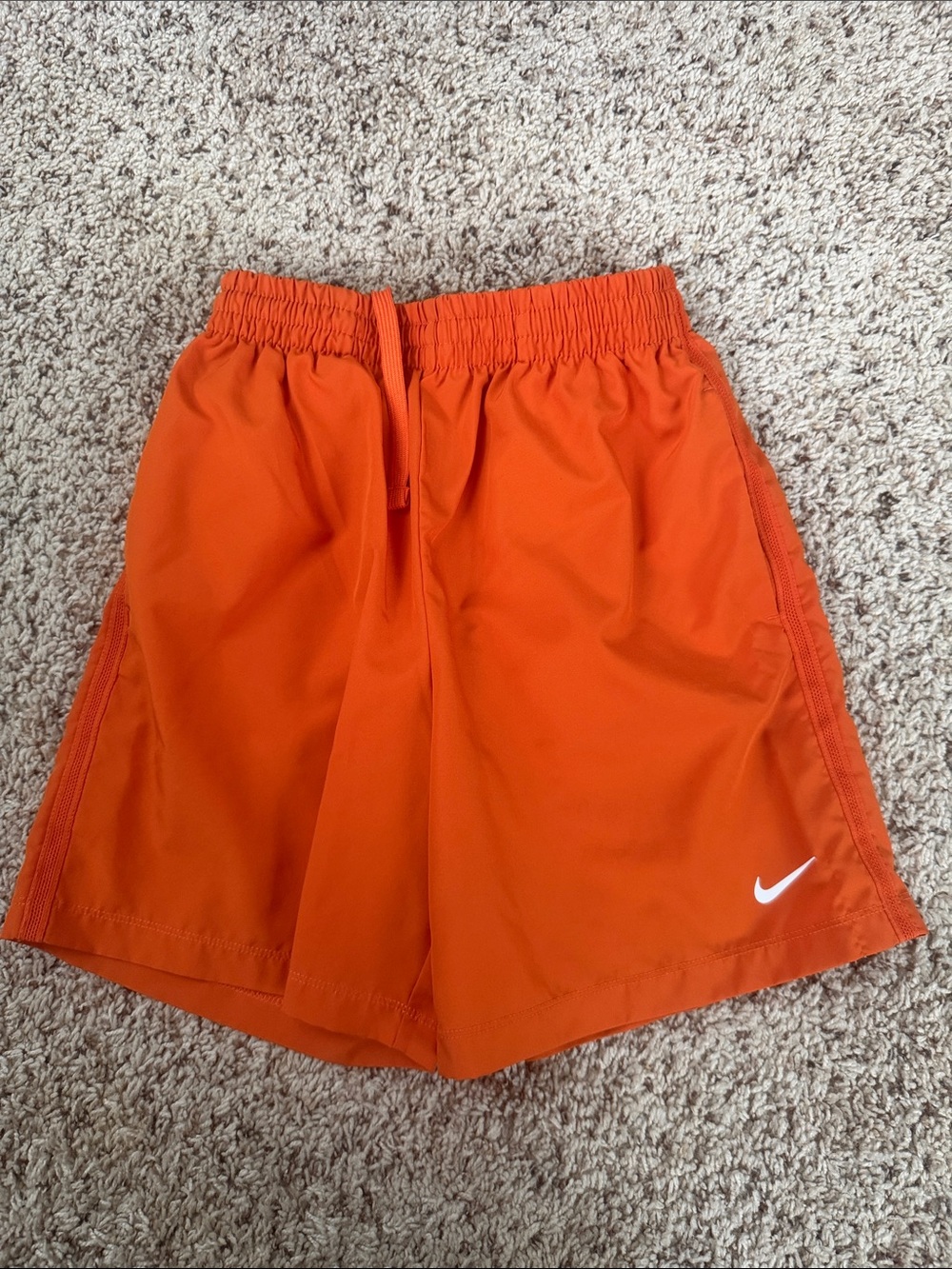 Nike Bright Orange Athletic Shorts with White Swoosh